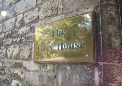 grey-house-sign