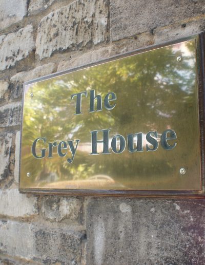 grey-house-sign